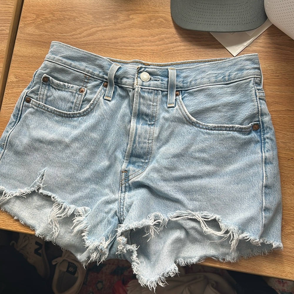 Levi jean shorts. Light blue wash. Worn but still in great condition